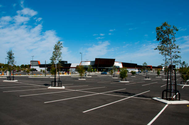 Newly paved parking lot of a mall.
